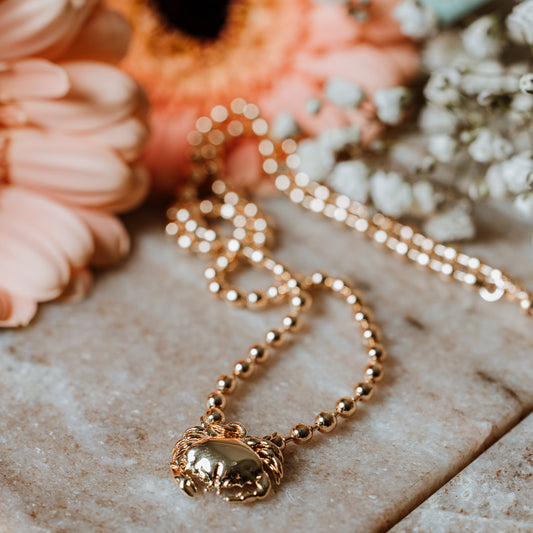 Ball chain necklace with crab pendant