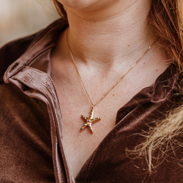 18 Carat Gold Plated Starfish Necklace, starfish necklace, enamel necklace, gold necklace, sea theme jewellery, love green jewellery, vogue, tattler, London fashion week, high end fashion.