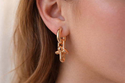 Bold Link Hoop Earrings, woman wearing Bold Link Hoop Earrings, link hoops, bold link earrings, gold earrings.