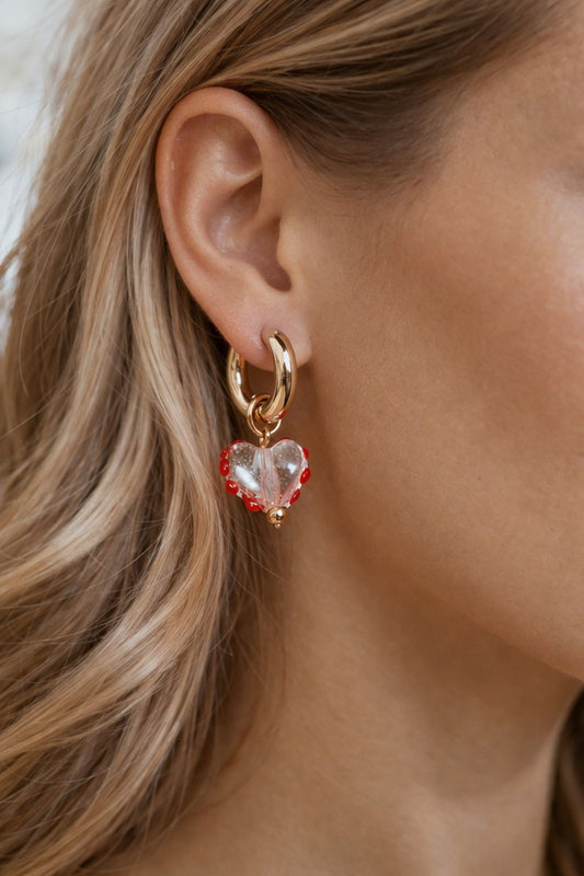 Chunky Gold Hoops with Murano Glass Heart, woman wearing Chunky Gold Hoops with Murano Glass Heart, Murano glass, Murano glass earrings, heart earrings, gold hoops, gold earrings