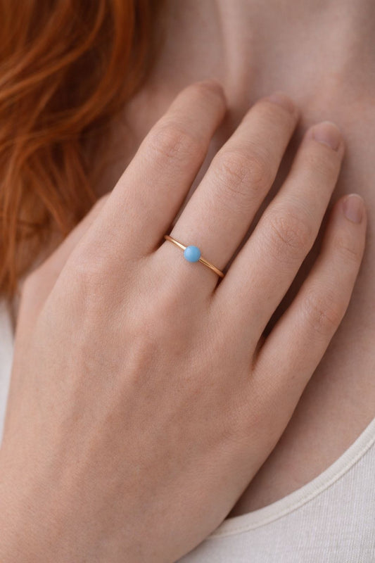 Lady wearing Delicate Pastel Enamel Stacker Rings, pastel enamel, stacker rings, pink stacker ring, blue stacker ring, green stacker ring, gold ring, gold enamel ring. 