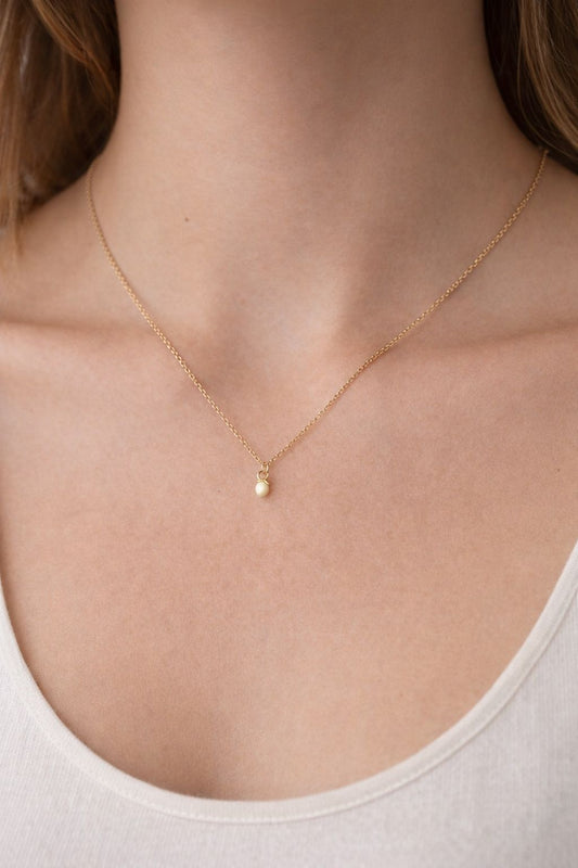 Gold necklace, lemonade yellow charm, yellow dot necklace, lady wear gold necklace, gold necklace with yellow dot charm