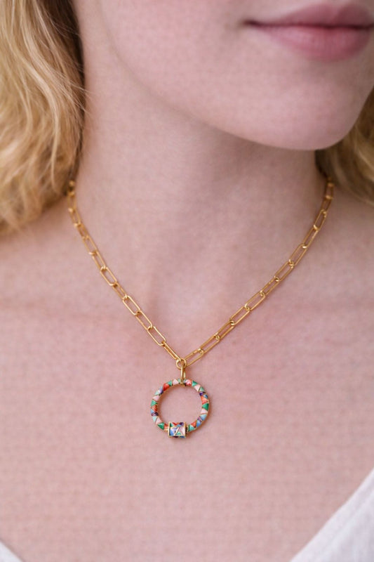 Gold paperclip chain, paperclip chain, enamel carabiner, enamel necklace, bright colour necklace, multicoloured charm, lady wearing gold paperclip necklace with multicoloured enamel carabiner charm