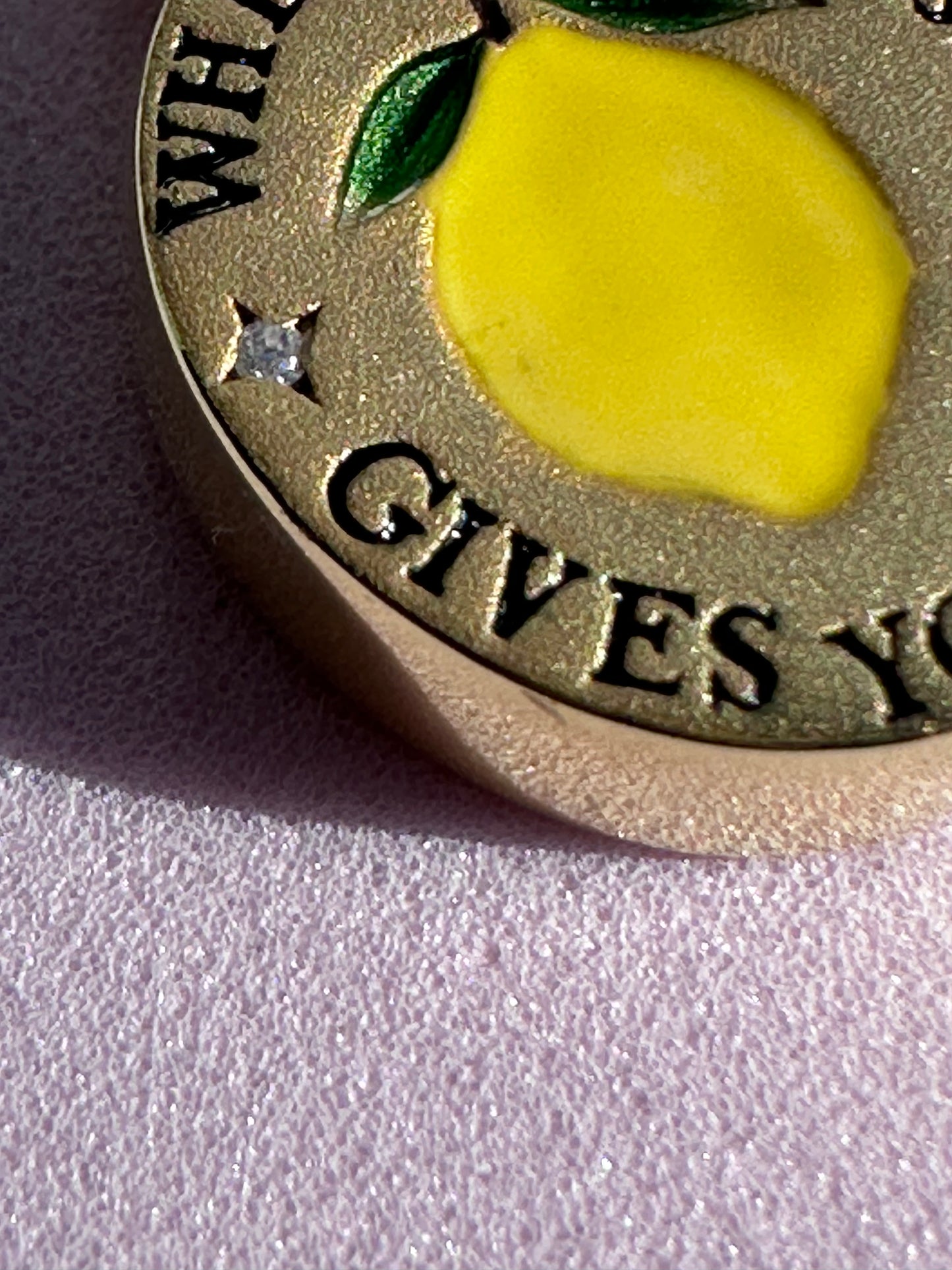 18k gold-plated pendant with ‘When Life Gives You Lemons’ engraved quote on delicate chain.
Close-up of gold-plated motivational pendant necklace with engraved quote.
'When Life Gives You Lemons’ engraved pendant necklace in gold-plated finish.