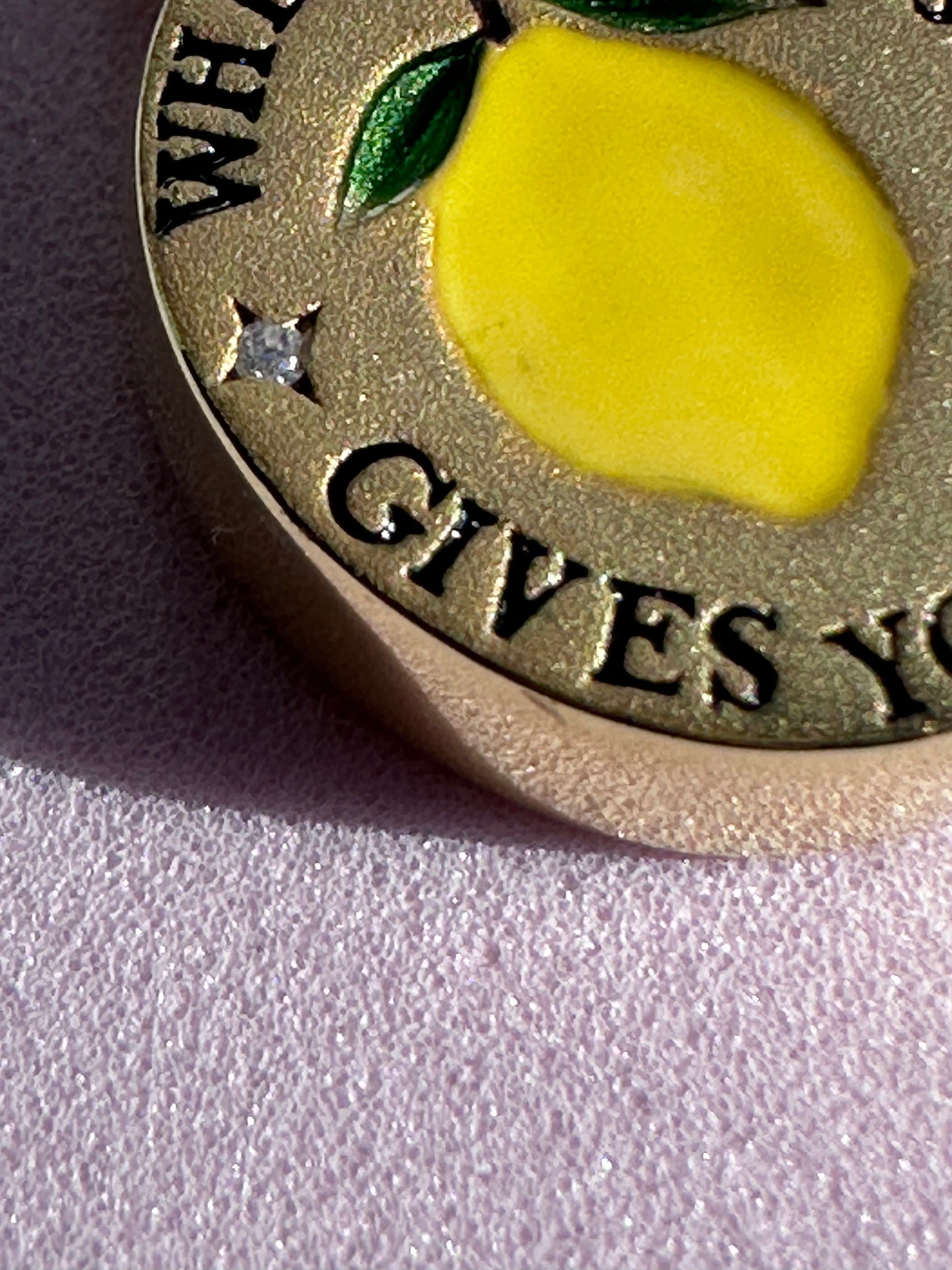 18k gold-plated pendant with ‘When Life Gives You Lemons’ engraved quote on delicate chain.
Close-up of gold-plated motivational pendant necklace with engraved quote.
'When Life Gives You Lemons’ engraved pendant necklace in gold-plated finish.
